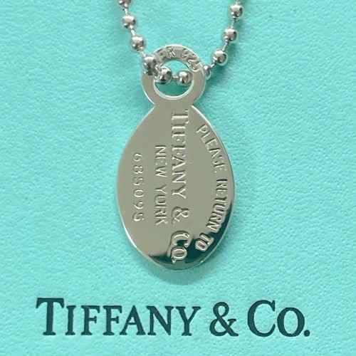 Tiffany return oval tag - to,