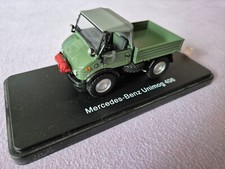 Schuco 03155 Mercedes Unimog U406, mit Winde und Planenverdeck in Vitrine 1:43