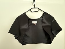 Schwarz schimmerndes Jäckchen