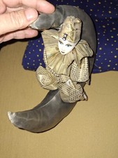 harlekin porzellan puppe. Auf