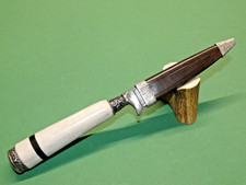  Trachtenmesser, Jagdmesser, Damastklinge, mit Büffelhorn im Knochen Griff