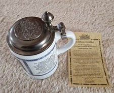Bierkrug mit Zinndeckel aus