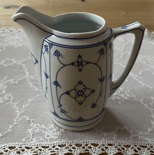 Alte Milchkanne Strohblume