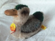 Steiff Ente 90er Jahre 15cm hoch mit Etikett und Knopf mit Fähnchen