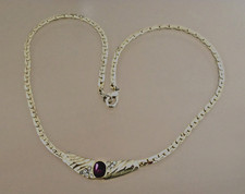 vergoldete Halskette, Collier mit lila facettiertem Stein und Kristalle, Schmuck