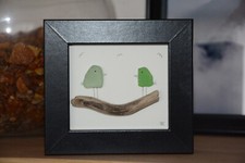 Seeglas-Bild "Vogelpaar an der