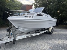 Motorboot mit Kajüte + 90PS