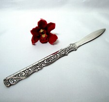 alter Brieföffner mit Werbung