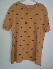 Apricotfarbiges Shirt Kurzarm mit schwarzen "Spinnen-Alloverdruck" Gr. 122/128