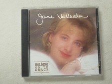 JANE VALENTA HOLDING ONTO