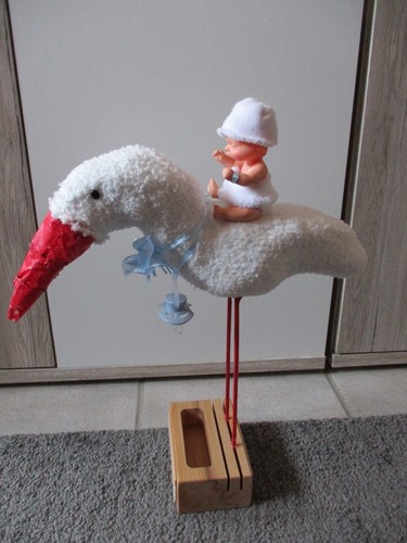 Storch mit baby und - storch,