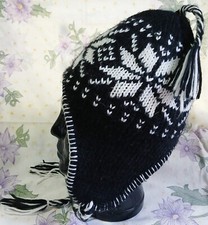 Schicke Norwegermütze für warme Ohren in schwarz-weiß, Einheitsgröße