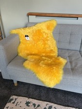 Gelber Lammfell Teppich groß