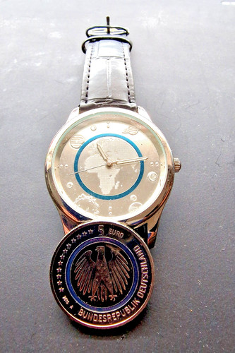 Euro münze mit - 5, uhr