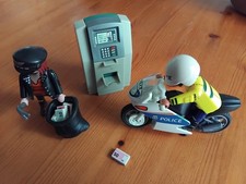 PLAYMOBIL 70572 Polizei-Motorrad: Verfolgung des Geldräubers