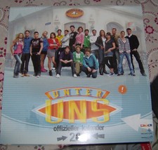 UNTER UNS Kalender 2011-mit großen Quer-Poster der Darsteller von 2011