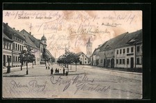 Jessnitz i. Anh., Ansichtskarte, Passanten in der Hauptstraße 1912 
