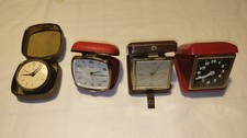 4 alte Reisewecker von Emes, Anker, Idea und Ankra - mechanisch