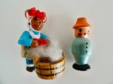 Kleines Männchen und Kuh mit