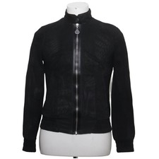 Rudolf Dassler, Lederjacke
