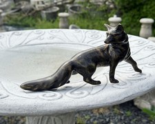 Bronzefigur Fuchs zurück