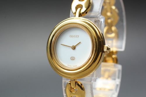 Gucci change bezel gold - 11/12,