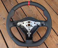 NEW LEATHER STEERING WHEEL FOR