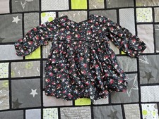 Schwarzes Kleid m. Blumen / Größe 68