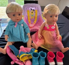 Baby Born Weichkörper Schwester Zwillinge. 2 x Puppen + Autositz, 2 x Outfits etc sehr guter Zustand