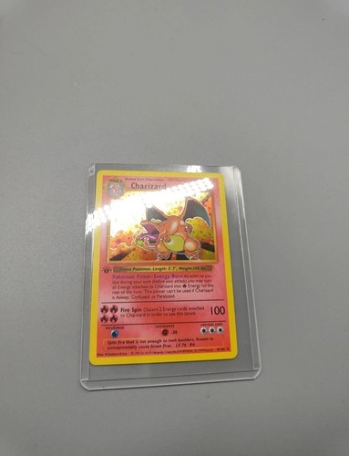 Charizard 1st edition - 1st,
