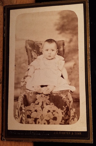 Sitting little child - little,
