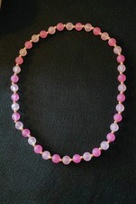 Perlenhalskette, Frostig