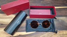 Cartier Sonnenbrille rund in Gold und braune Gläser