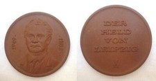 GDR porcelain medal the hero