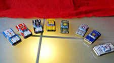 Acht Blechautos TN Toy Nomura