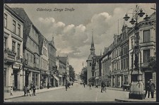 AK Oldenburg / O., Lange Straße mit Fahrradfahrer, Kinder, Geschäfte 
