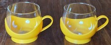 Melitta-Sextett, 2x Teegläser mit Kunststoffhalter, gelb, vintage, 70er Jahre