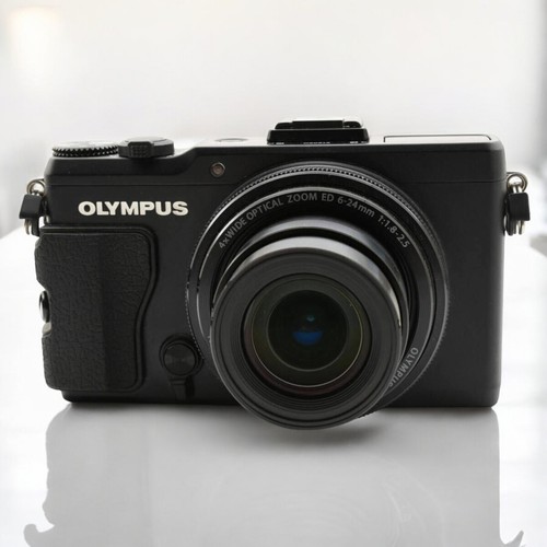 Fast neuwertig olympus - [fast,