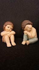 Goebel Figur  - Nina & Marco  -  Limpke -  Junge und Mädchen sitzend