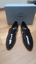 Schwarze Prada Lack Slipper, Gr. 39,5