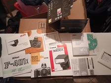 Bedienungsanleitungen Canon Nikon Metz