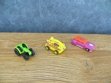 Ü-Eier Auto Rennwagen Traktor Mini Trecker grün gelb pink Ferrero