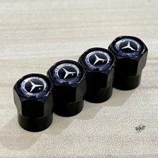 4X Logo Ventilkappen Schwarz