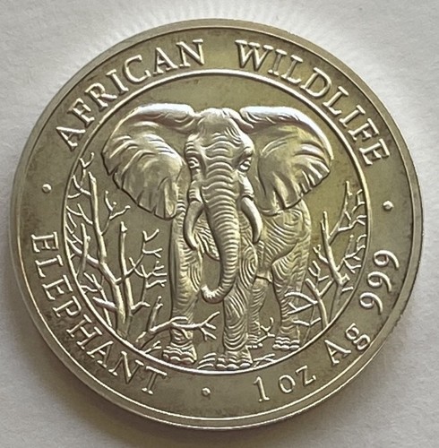 1000 shilling - -,