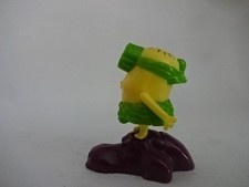 Minions Sammelfigur " Dino Minion auf  Felsen und schaut