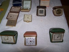 7 alte Reisewecker, Antik