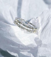 12 Baguette 0,55ct & 5