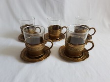 5 Teegläser von Schott mit Teeglashaltern aus messing mit 5 untersetzer...