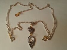 Auktion: Versilberte Kette mit silberfarbenen Osterhase- und Notenanhänger