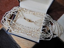 4reihige Flussperlen Halskette mit 585 Gold Verschluss und Diamanten 